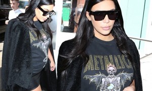 Kim Kardashian enjoys New York City by embarking on a shopping spree in her downtime. The pregnant reality star showed a little leg by wearing a short leather skirt and knee-high boots. September 11, 2015 X17online.com